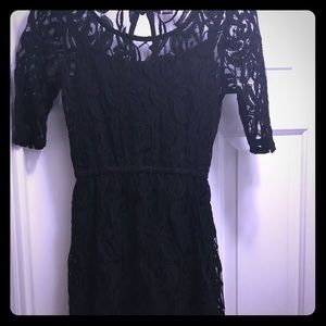 Short, black lace dress with short sleeves